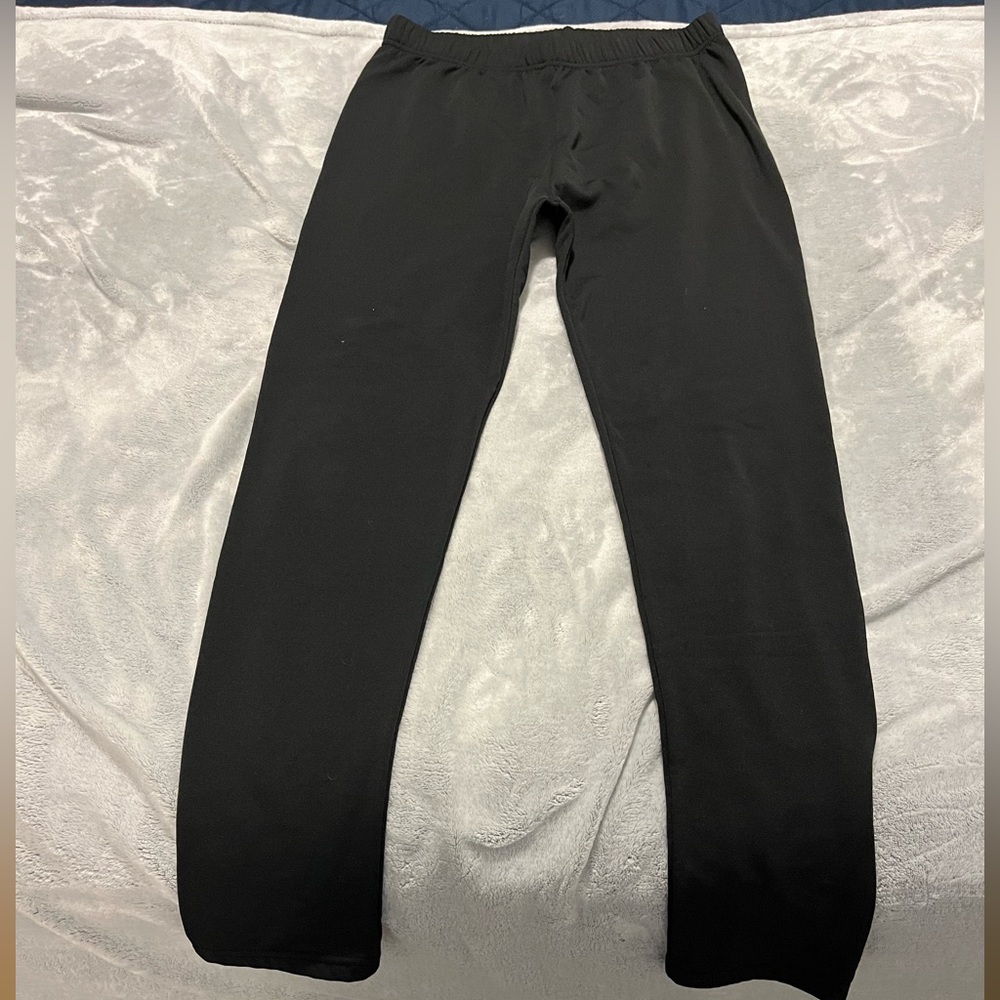 Black stretchy, leggings with fleece lining.